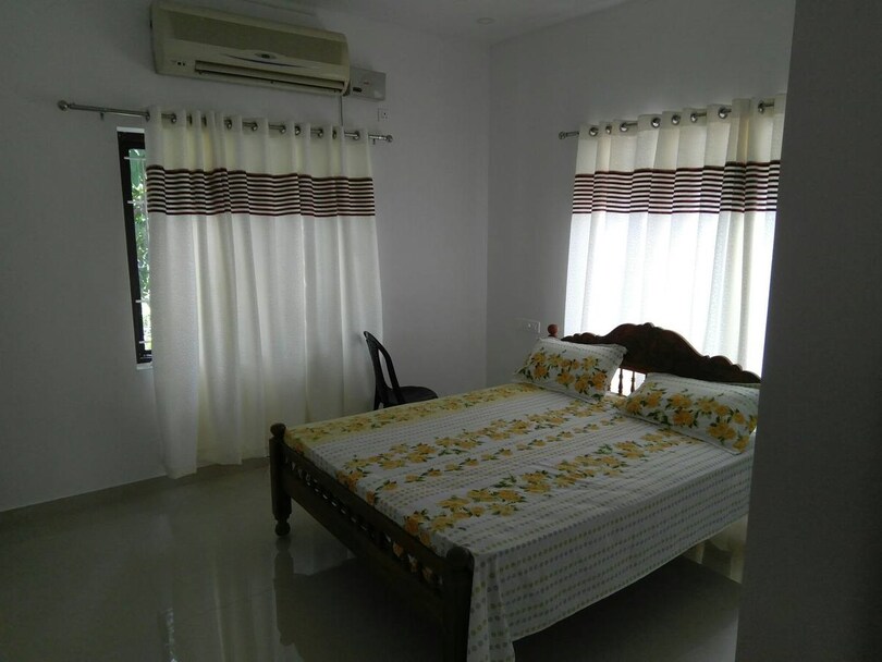 Second air-conditioned bedroom with windows on two sides